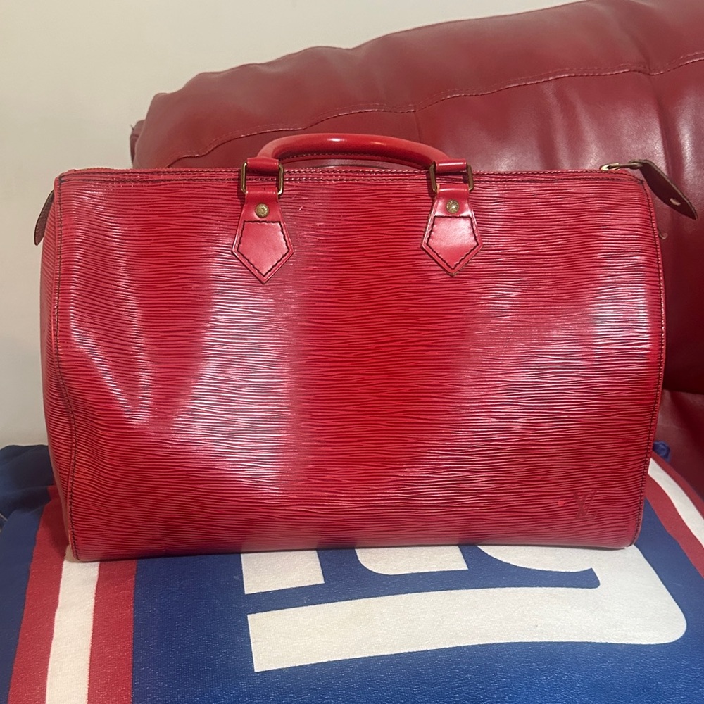 Louis Vuitton Red Duffel Bag